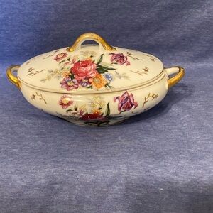 Antique porcelain hand painted covered dish.